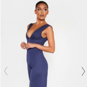 NAVY PLUNGE SLEEVELESS CULOTTE JUMPSUIT